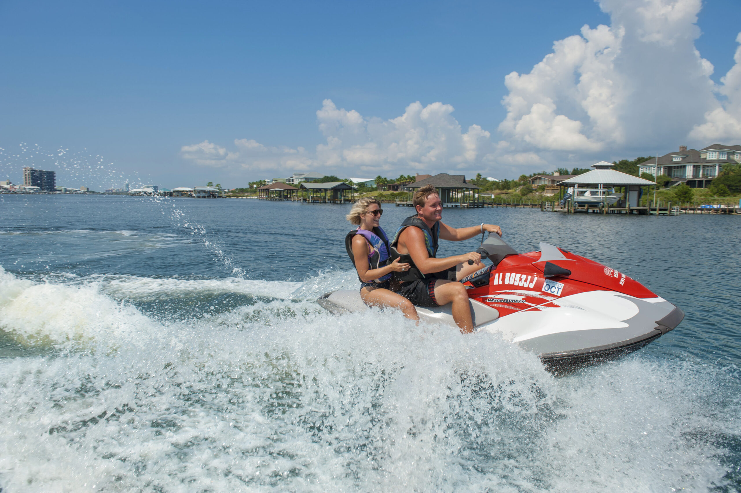 jet ski riding image courtesy of visit pensacola
